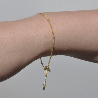 PULSERA MAW DORADA