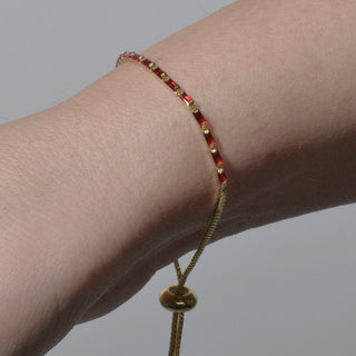 PULSERA STAT ROJA