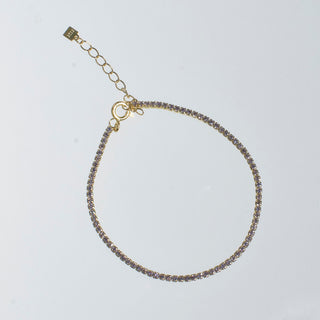 PULSERA ARECA DORADA MORADA